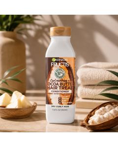 بلسم Garnier Fructis Hair Treat بزبدة الكاكاو للشعر الكيرلي والجاف – 350 مل